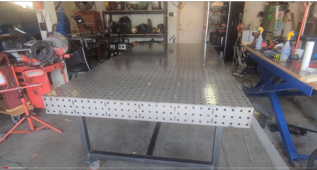 wielding table in a garage